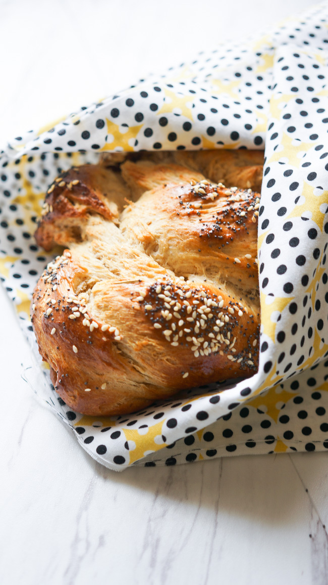 Braided Herb Challah. A soft and sweet bread with savory herbs braided into a beautiful loaf! 