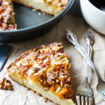 Nutty Plum Kuchen. A delicious buttery cake with fresh plums, nuts, and a cinnamon sugar topping.