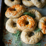 Rosemary Garlic Bagels. Wheat bagels chock full of fragrant rosemary and toasted garlic. The smell coming from your kitchen while these are baking will make your mouth water!