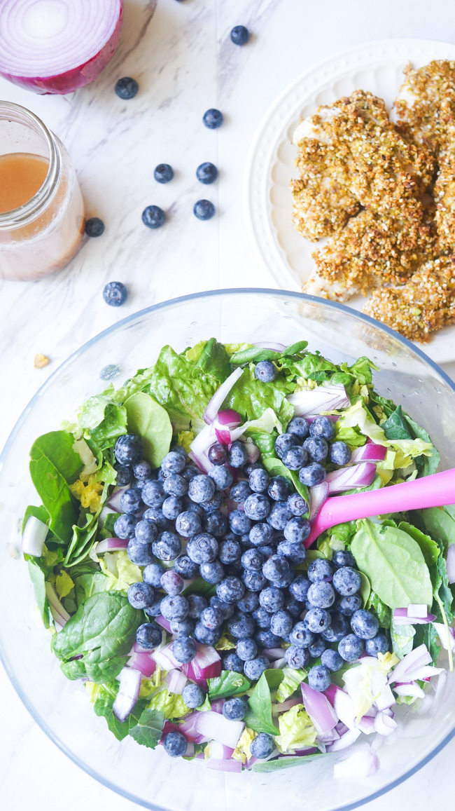 This Pistachio Crusted Chicken Salad is full of flavor! Packed with nuts, blueberries, and healthy greens, you won't want to stop eating!