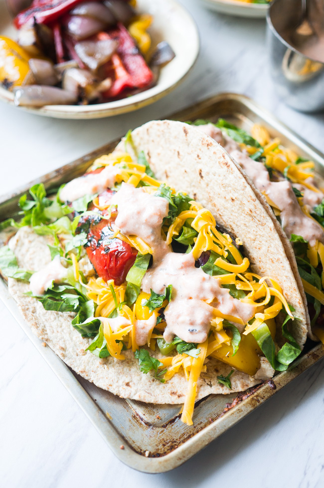 Chicken Fajitas with Charred Bell Peppers. A classic favorite of mine, chicken is pressure cooked in only 5 minutes, while bell peppers and onion are being charred on the grill, creating a deliciously charred and smokey flavor.