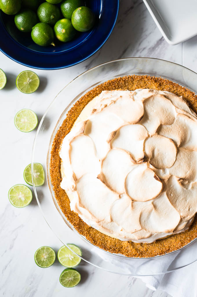 Key Lime Pie with Fluffy Meringue. A tart and creamy key lime filling with a fluffy sweet meringue on top!
