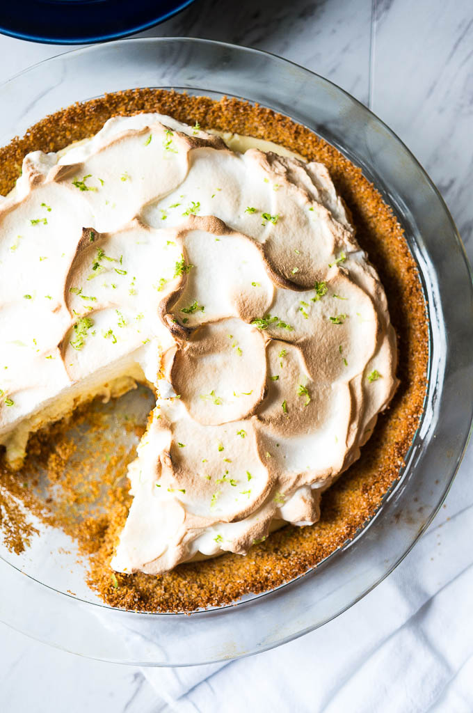 Key Lime Pie with Fluffy Meringue. A tart and creamy key lime filling with a fluffy sweet meringue on top!