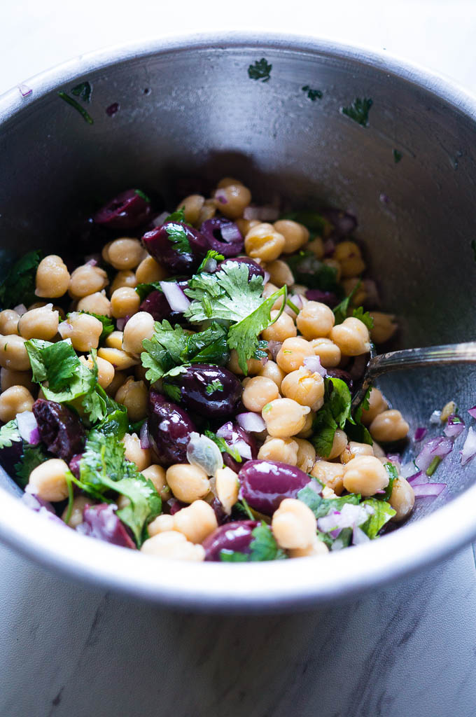 Chickpea Salad with Lemon, Tuna, and Olives. The perfect lunch for 2: a fresh, pantry staple meal that is good on the budget and even better for you!