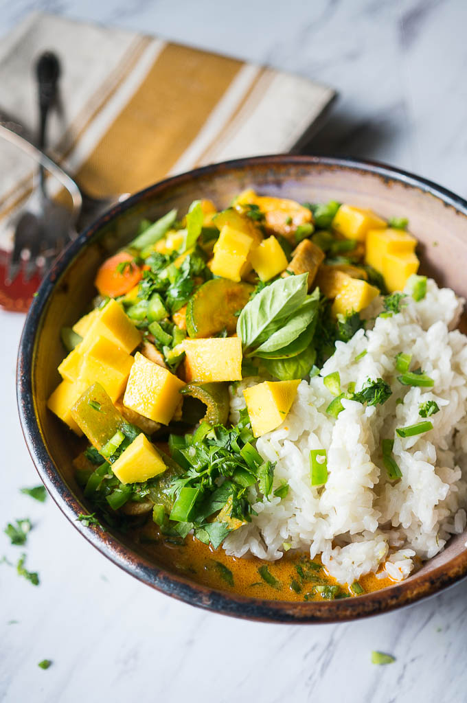 Summertime Mango Chicken Curry with Pressure Cooker Coconut Rice. A healthy and satisfying curry with summer fruits and vegetables on a bed of rich coconut rice.