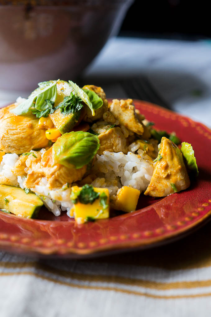 Summertime Mango Chicken Curry with Pressure Cooker Coconut Rice. A healthy and satisfying curry with summer fruits and vegetables on a bed of rich coconut rice.