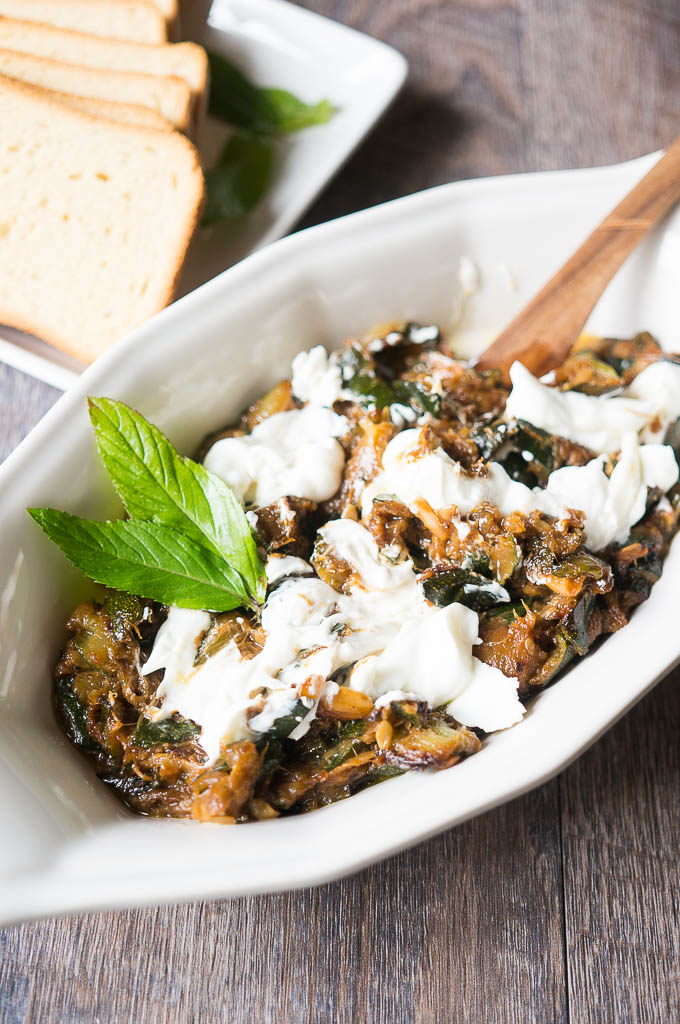 Roasted Garlic and Zucchini Dip. The strong and vibrant flavors of garlic roasted with zucchini, then topped with greek yogurt and mint. 