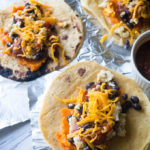 Freezer Breakfast Burritos. A great solution to morning craziness! Make a batch of these at the beginning of the week and have hearty, healthy breakfasts ready to go!