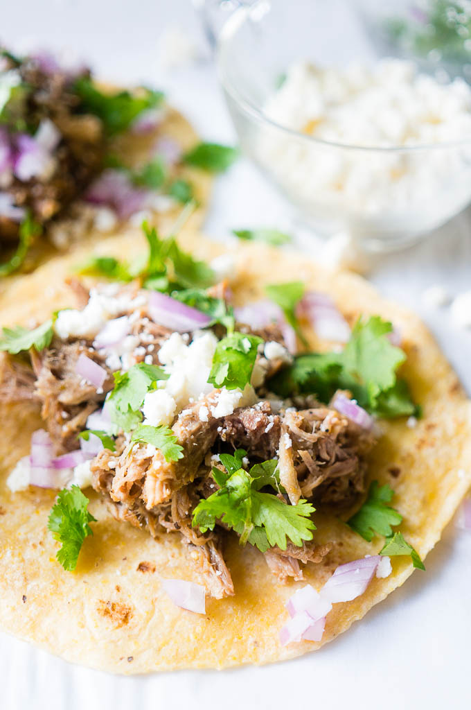 Pressure Cooker Green Chile Pork Carnitas. Moist, flavor-packed, and fall apart in your mouth tender, these green chili pork tacos are the perfect solution for a speedy family friendly dinner!
