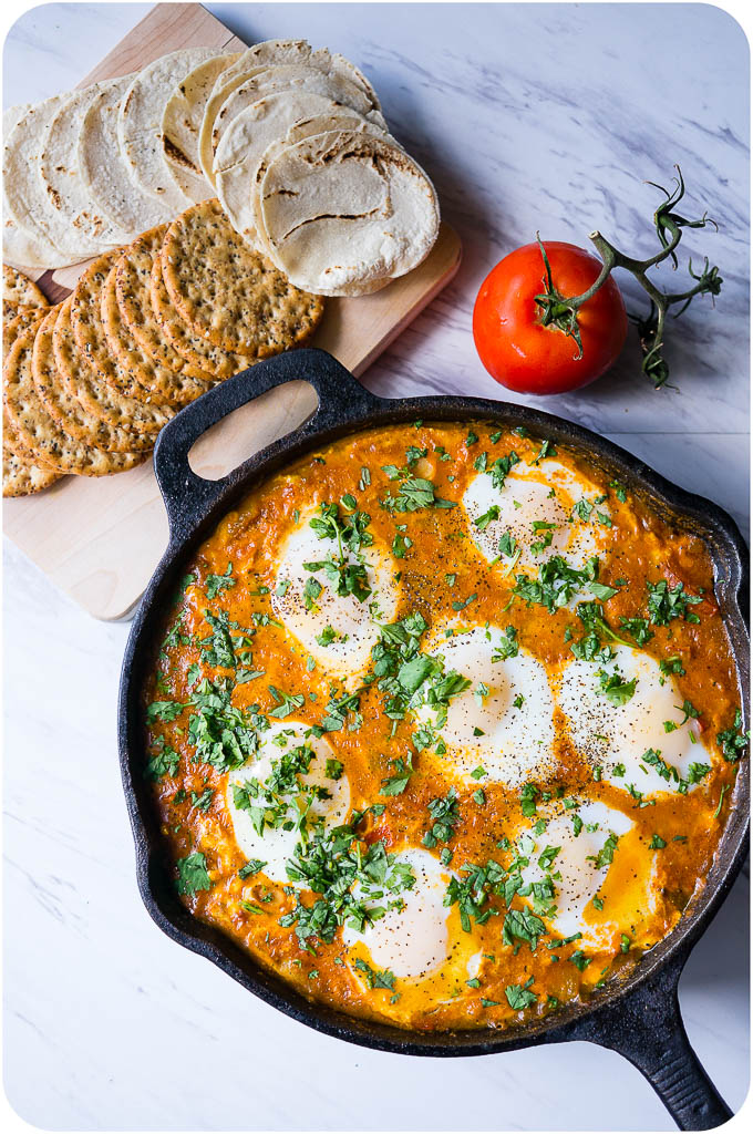 Baked Egg Shakshouka with Butter Beans. A bright and tangy Israeli tomato dish that is versatile enough to be enjoyed for brunch, lunch, or dinner!