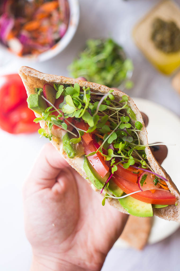 Veggie Pitas with Hummus. No being disappointed by a bland veggie sandwich, this one is PACKED with flavor and texture, making it the perfect light healthy lunch.