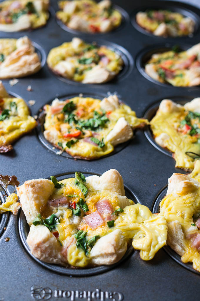 Ham and Cheese Mini Quiches. Pop these irresistible muffin cup quiches in the oven for a savory and filling breakfast!