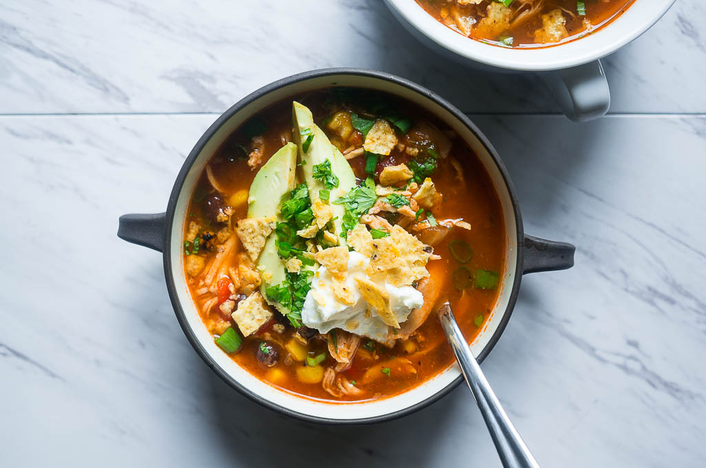 Pressure Cooker Chicken Tortilla Soup. All in one pot and bursting with flavor, this AhhMazing soup will NOT let you down.