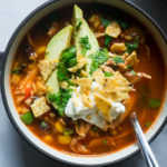 Pressure Cooker Chicken Tortilla Soup. All in one pot and bursting with flavor, this AhhMazing soup will NOT let you down.
