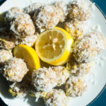 Lemon Coconut Snack Bites. A healthy oatmeal treat rolled in coconut and packed with chia seeds, lemon zest, nuts, and more!