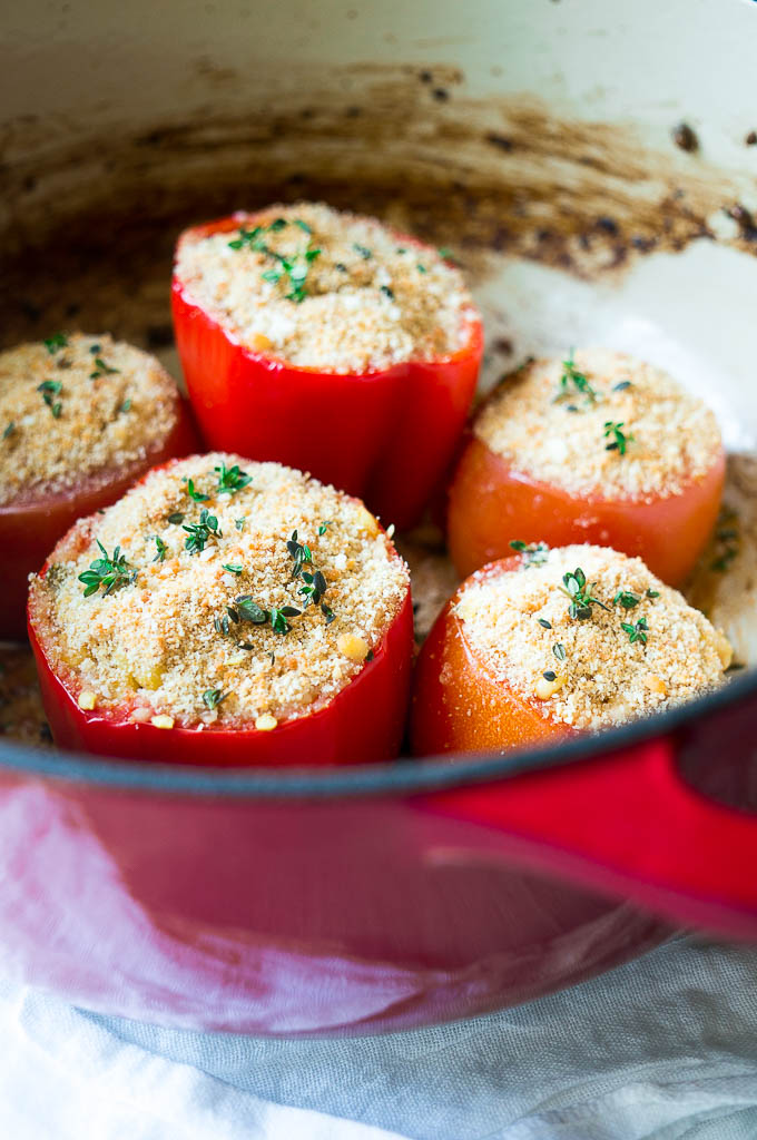Jalapeño Corn Stuffed Peppers and Tomatoes. Filled with creamy fresh corn, sprigs of thyme, and bright tomato pulp, this is a great warm weather side dish!