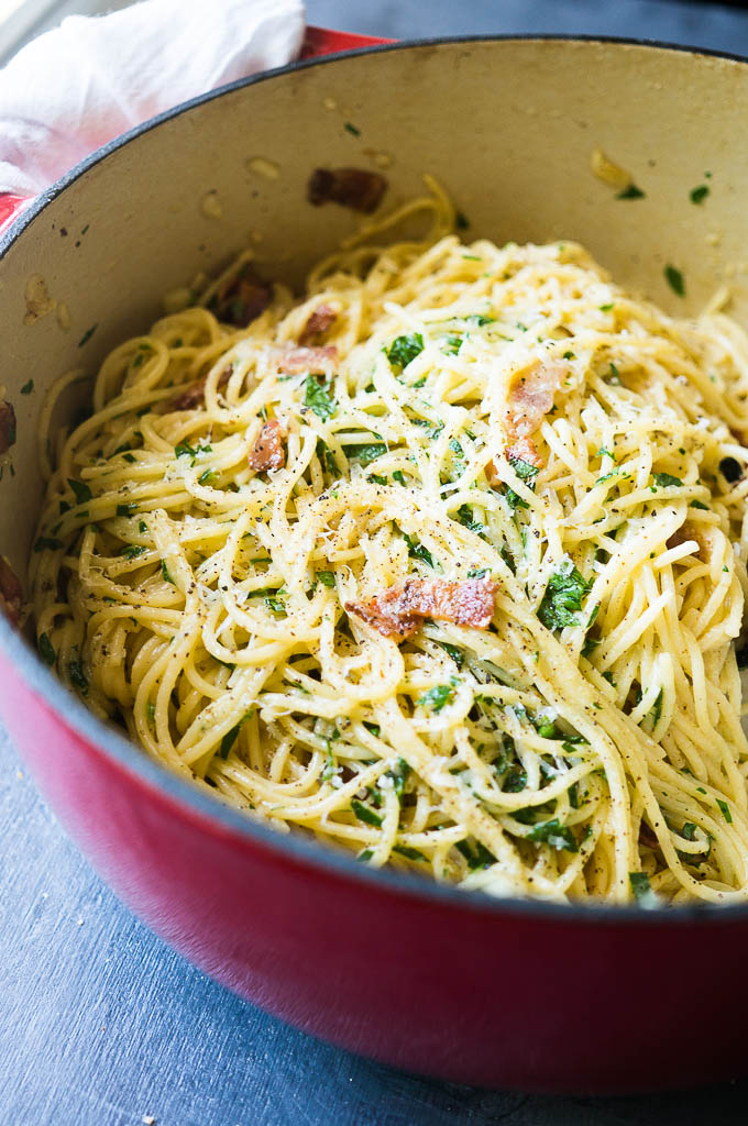 Spaghetti Alla Carbonara. Infused with bits of crispy bacon, rich olive oil, and nutty parmesan cheese, this go-to carbonara recipe is a dinner favorite for even the pickiest eaters!