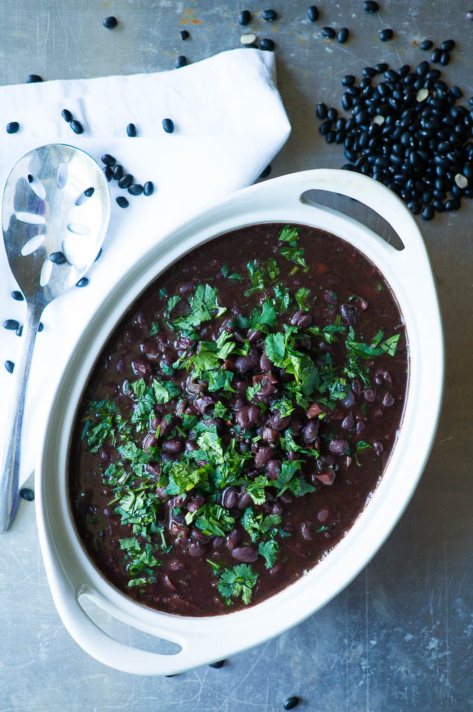 These Pressure/Slow Cooker Cuban Black Beans are filled with lime juice, a trio of red bell pepper, jalapeño, and red onion, and finished off with bunches of fresh cilantro!