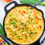 Pimiento Mac and Cheese is ultra creamy with bacon bits, crisp green onion, and a light dash of hot sauce for an added little kick.