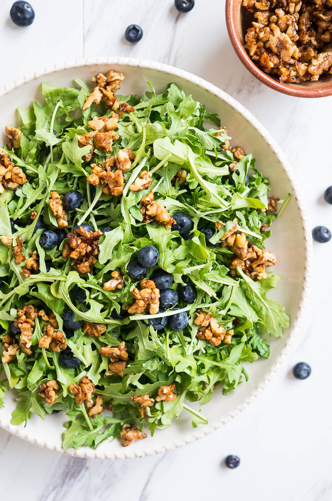 Blueberry, Arugula, and Toasted Walnut Salad is drizzled with a balsamic orange dressing and is the winner in the most refreshing summer salad category!