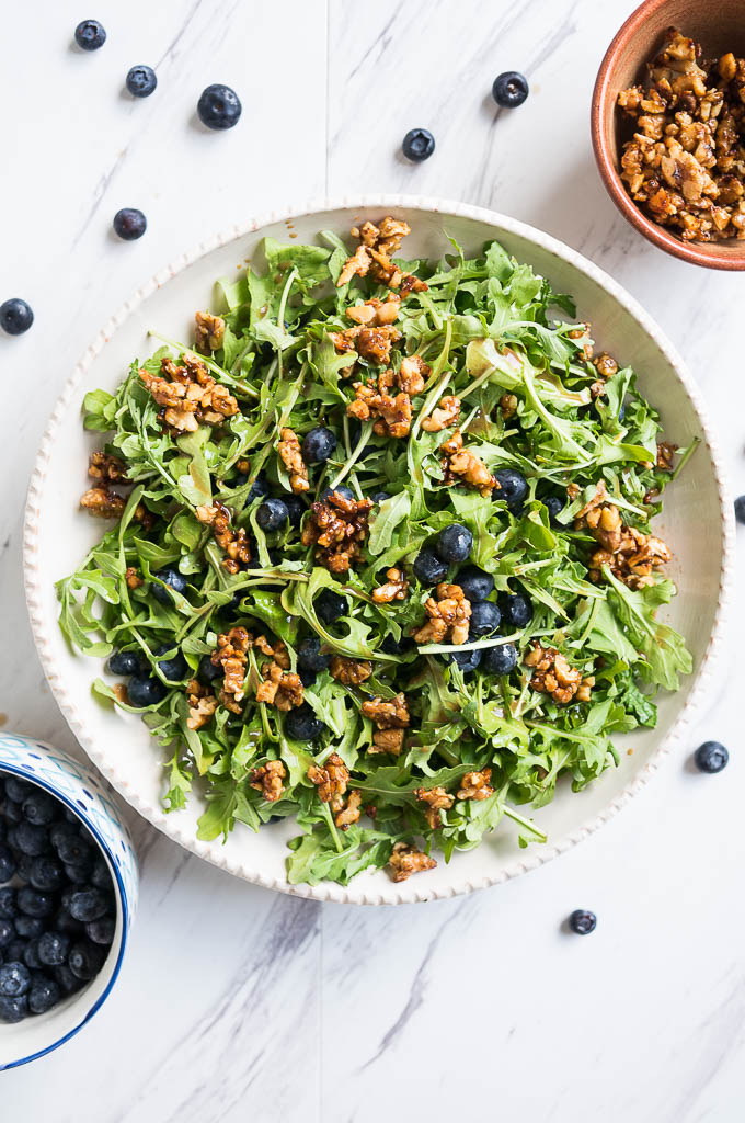 Blueberry, Arugula, and Toasted Walnut Salad is drizzled with a balsamic orange dressing and is the winner in the most refreshing summer salad category!