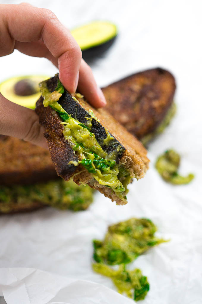Mean Green Grilled Cheese sandwiches have mashed avocado, basil, two cheeses, and spinach - what more could you need?
