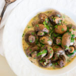 Pressure Cooker Garlic Herb Mushrooms are an easy and satisfying side dish that can be enjoyed alone or mixed into pasta, sliced and put on sandwiches, or any number of other possibilities!