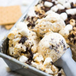 Crushed graham crackers, chocolate bits, and mini mallows bring the campfire to you in this amazing and EASY S'Mores No Churn Ice Cream!
