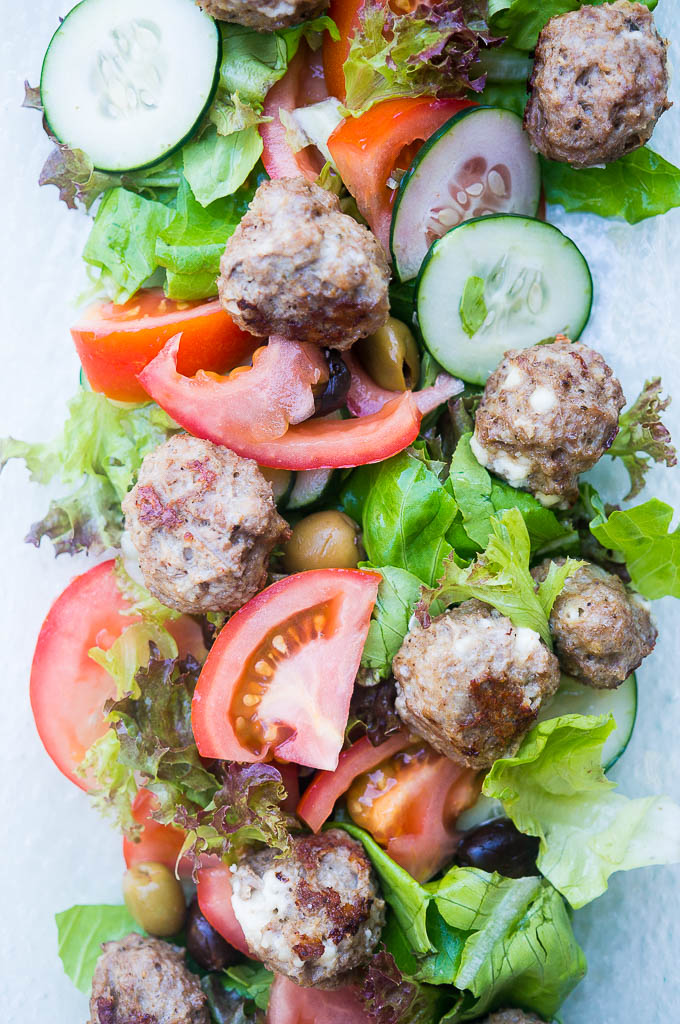 Impress your guests with these fancy pants Pressure Cooker Greek Lamb Meatballs with Salad and Tzatziki. The secret? It's 10X easier than it looks!!
