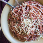 Jazz up pasta night with this red wine infused spaghetti with savory shallots and salty pancetta.