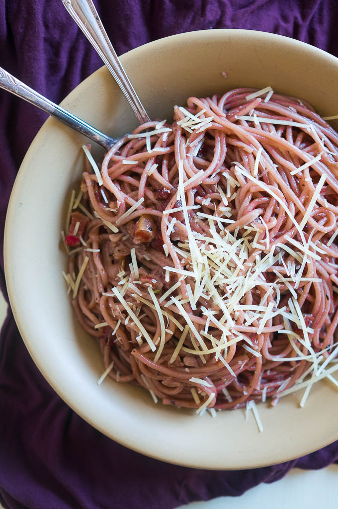 Jazz up pasta night with this red wine infused spaghetti with savory shallots and salty pancetta.