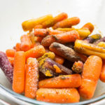 Oven Roasted Curried Cardamom Carrots - a 4 ingredient weeknight side dish that kicks your carrots up a level!