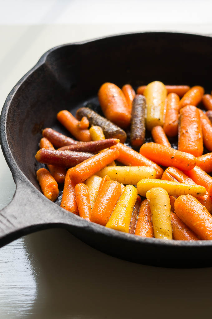 Oven Roasted Curried Cardamom Carrots - a 4 ingredient weeknight side dish that kicks your carrots up a level!