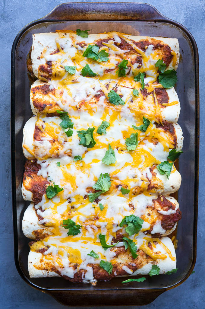 Harvest Veggie and Cheese Enchiladas - full of roasted fall veggies and classic mexican spice! You won't even miss the meat in this one!