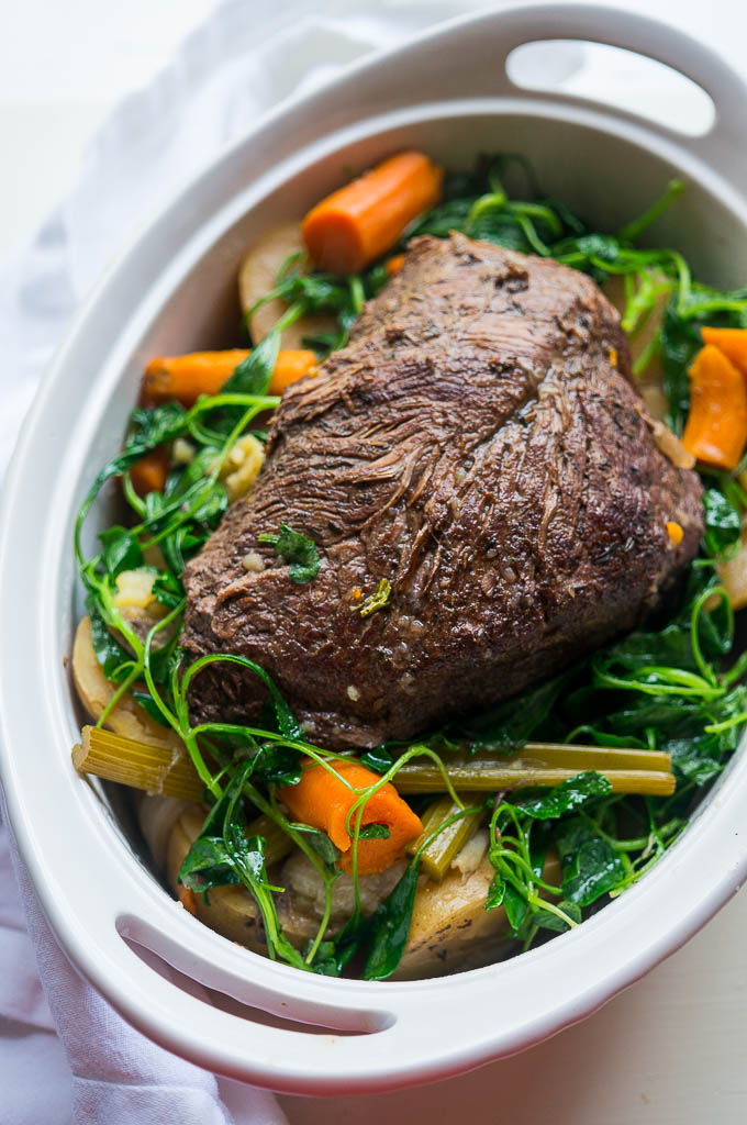 Pressure Cooker Kitchen Sink Pot Roast has the simple, old school flavors you're used to, with some baby kale added at the end for extra color and nutrition!