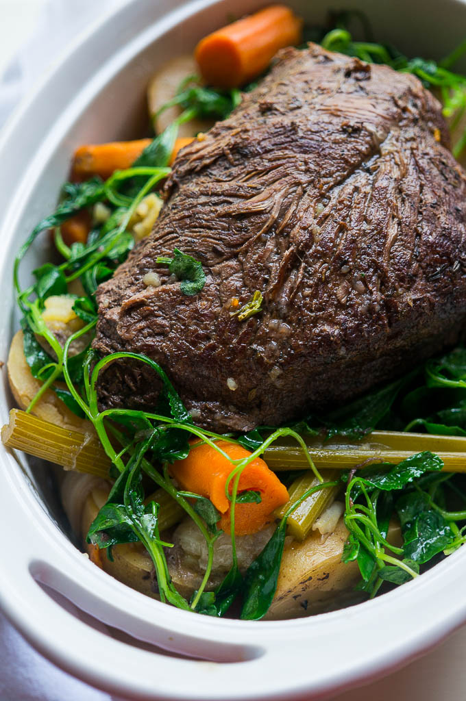 Pot Roast with Carrots, Potatoes, in a White Baking Dish