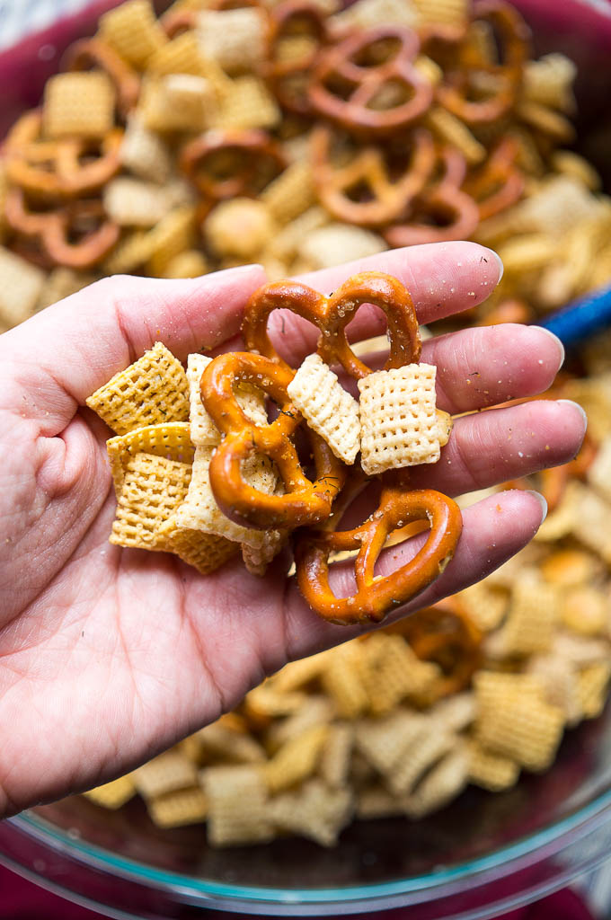 Slow Cooker Garlic Dill Snack Mix is a set it and forget about it party snack that'll keep you munching all night!