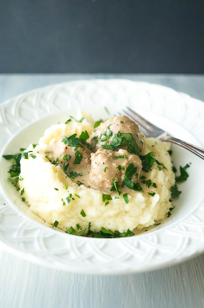 Pressure Cooker Swedish Turkey Meatballs served over creamy mashed potatoes is lean comfort food that feels like a guilty pleasure but is actually guilt-free!