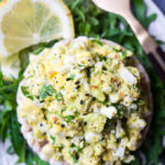 Pressure Cooker No Mayo Avocado Egg Salad is loaded with fresh herbs and arugula, AND there's no peeling any hard boiled eggs!! Read the post to figure out how!