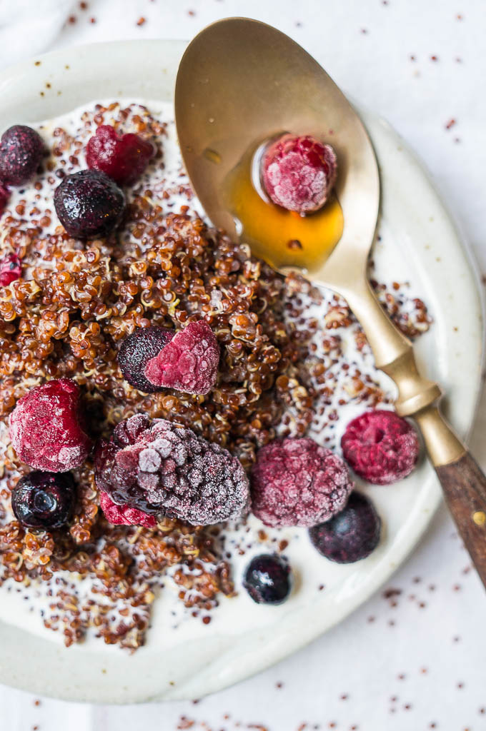 Pressure Cooker Buttery Berry Breakfast Quinoa is sweetened with maple syrup and cinnamon and packed with nutrients for a healthy breakfast!
