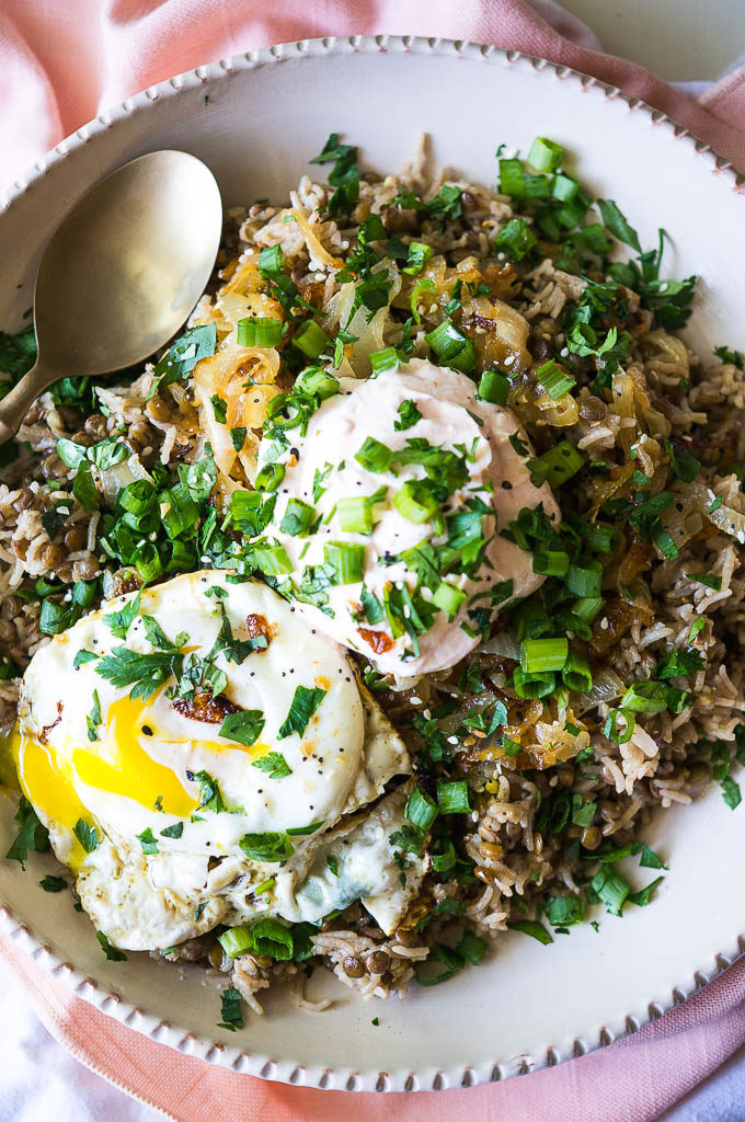 Rice, lentils, and a fried egg with parsley and cilantro.