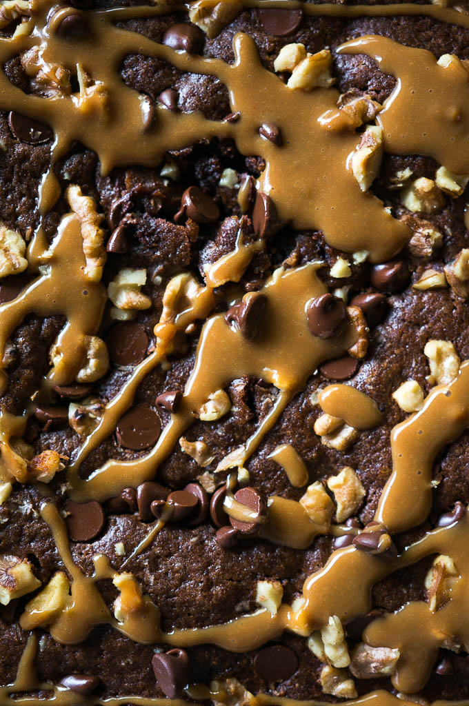 Brownies drizzled in caramel with chocolate chips